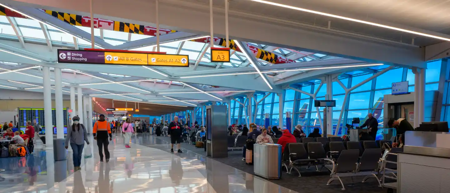 BWI airport shuttle service vehicle picking up passengers at Baltimore/Washington International Airport
