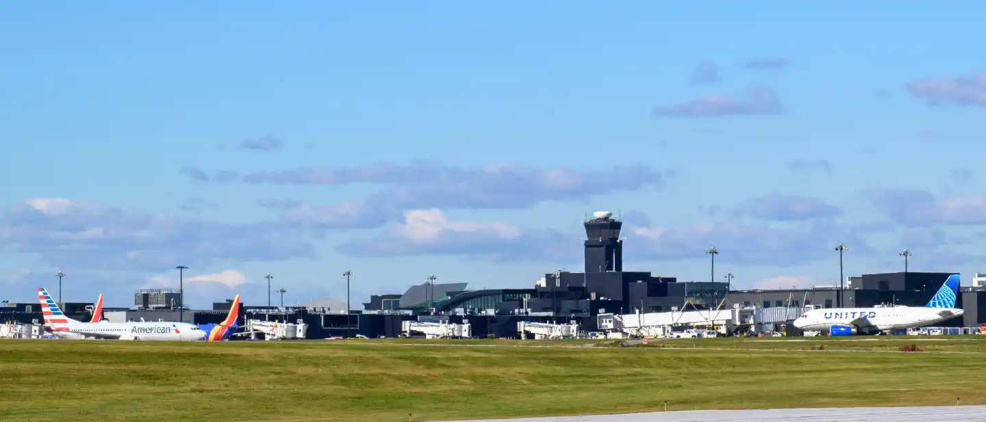 BWI airport shuttle service vehicle picking up passengers at Baltimore/Washington International Airport