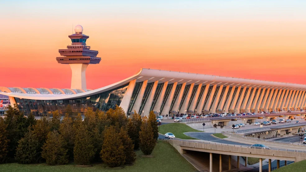 BWI airport shuttle service vehicle picking up passengers at Baltimore/Washington International Airport